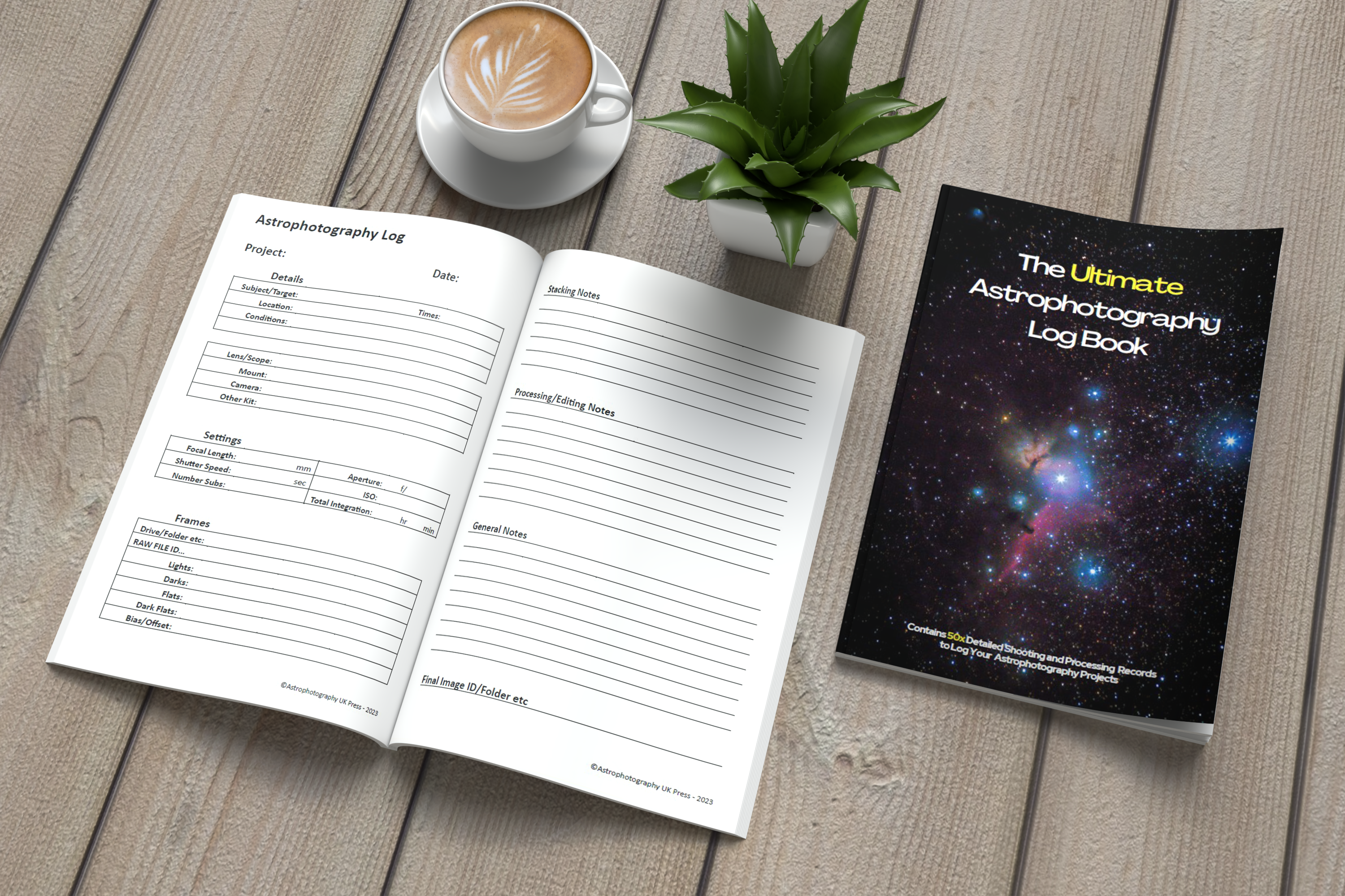 An image depicting The Ultimate Astrophotography Logbook cover with another copy open on a table, with a small potted plant and a coffeee cup