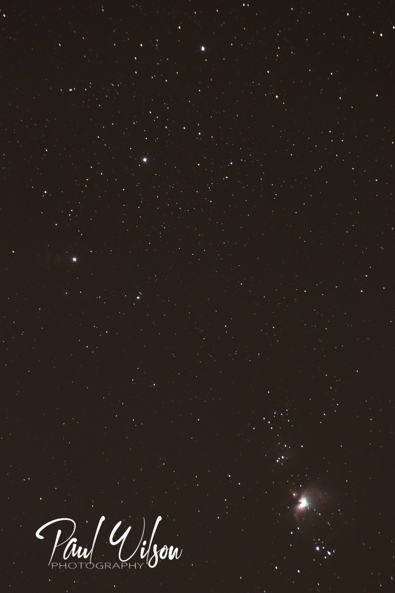 A single frame, portrait shot of the main Orion's Belt and Sword area of the Orion constellation